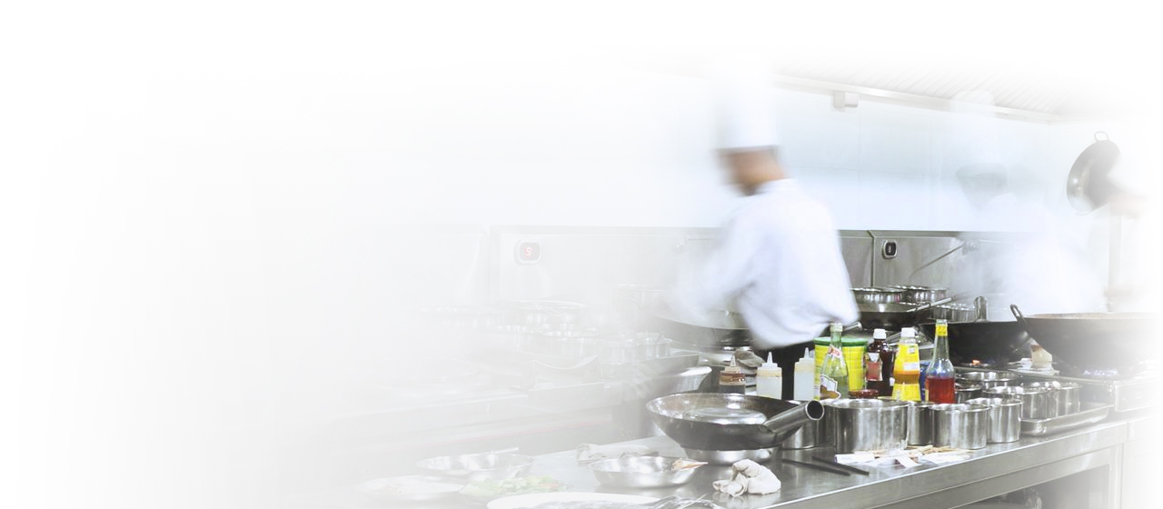 Chefs cooking in a restaurant kitchen