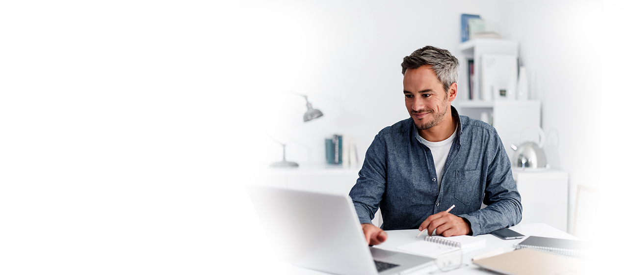Federal Tax Credit - Guy working on laptop